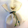 Μπομπονιέρα βάπτισης - σε λευκό χρώμα δεμένη με διακοσμητικό πουλάκι